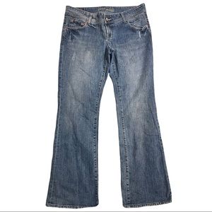 AMERICAN EAGLE - Artist flared jeans in a medium blue. Size 12, 32” inseam.